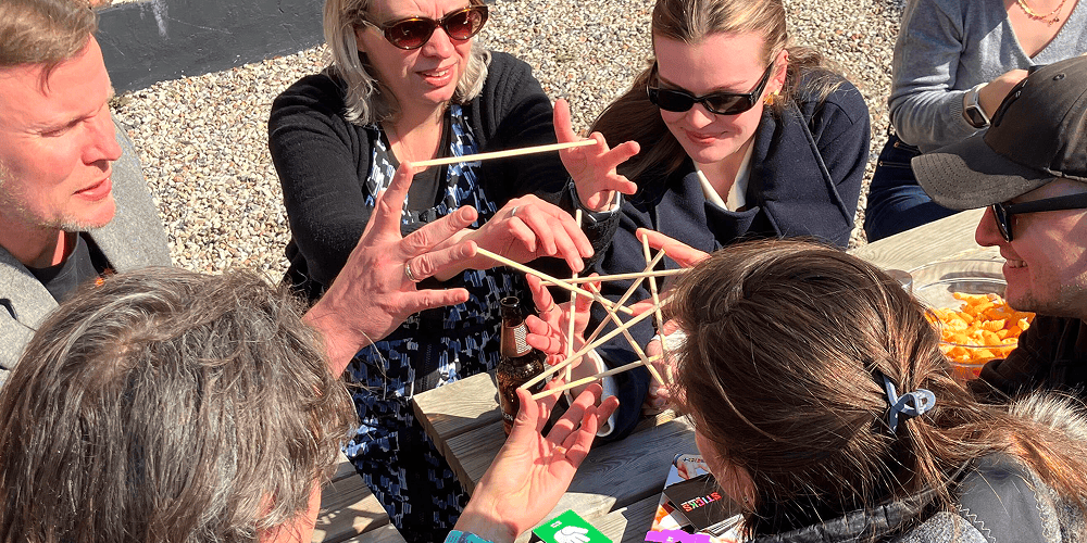 People playing Sticks