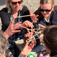 People playing Sticks